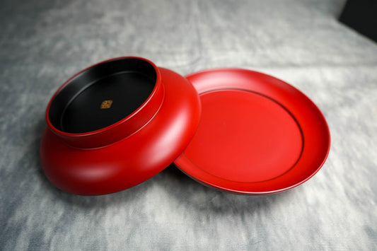 "Carefully handmade by two artisans, this beautiful vermilion lacquerware, finished with an elegant matte texture, captures the essence of Japanese traditional craftsmanship.