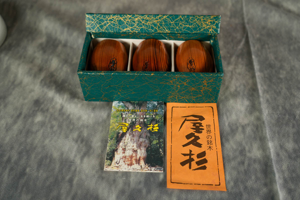 The Orignal Box of the Yakusugi Cedar, Japanese Sake Wooden Drinking Cup Set. One of the Precious Wood in the World.  The original slip from the manufacturer, and a note of how to handle Yakusugi products. 